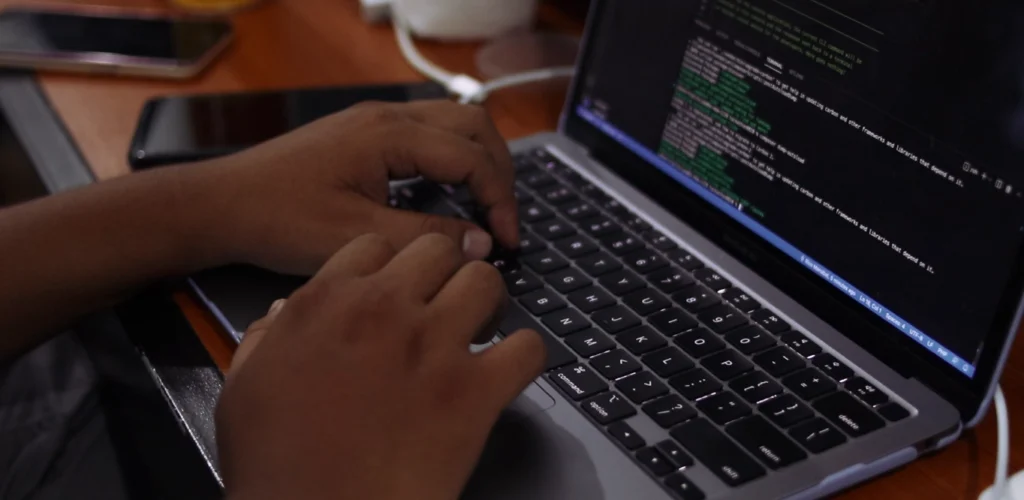 Person typing on a laptop