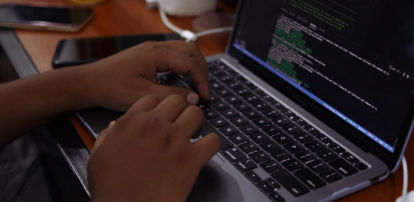 Person typing on a laptop