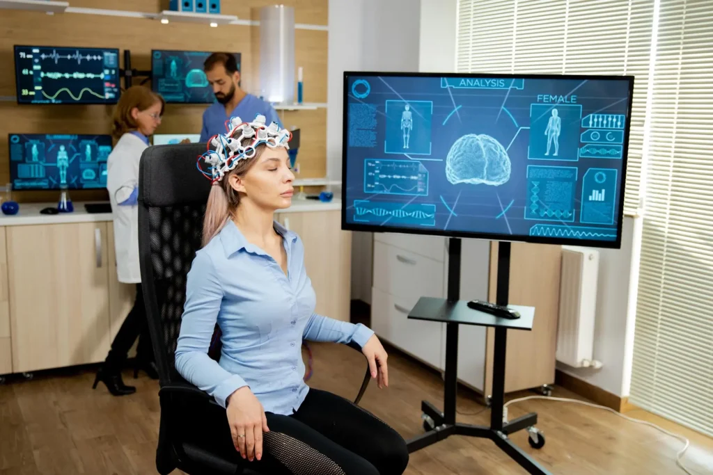 A woman with a wearable device on her head that collects health data in real-time