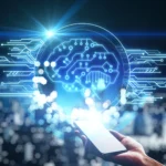 A hand holds a smartphone emitting a glowing digital brain with circuit patterns, symbolizing AI and technology. The background is a blurred cityscape at night.